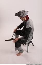 JACK PIRATE SITTING POSE WITH GUN AND DAGGER